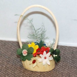 Blomma i Korg